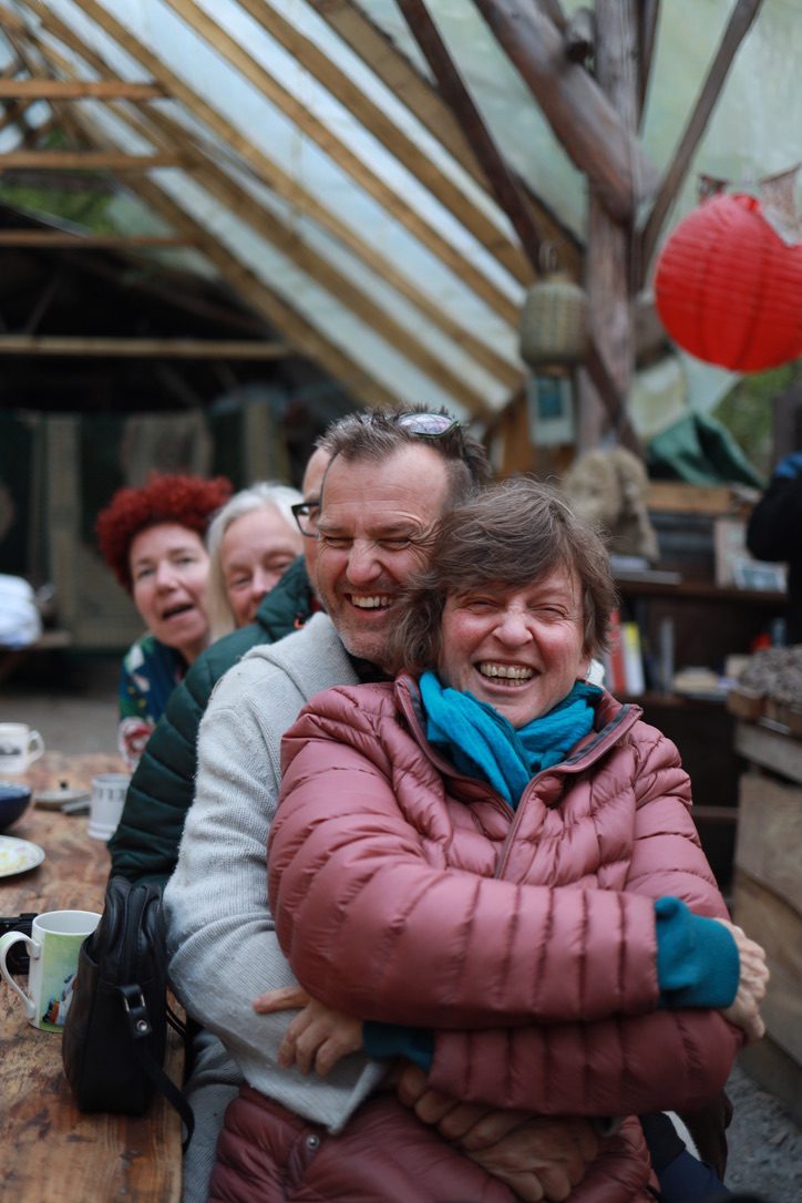Happy people after an Enlightenment Intnesive